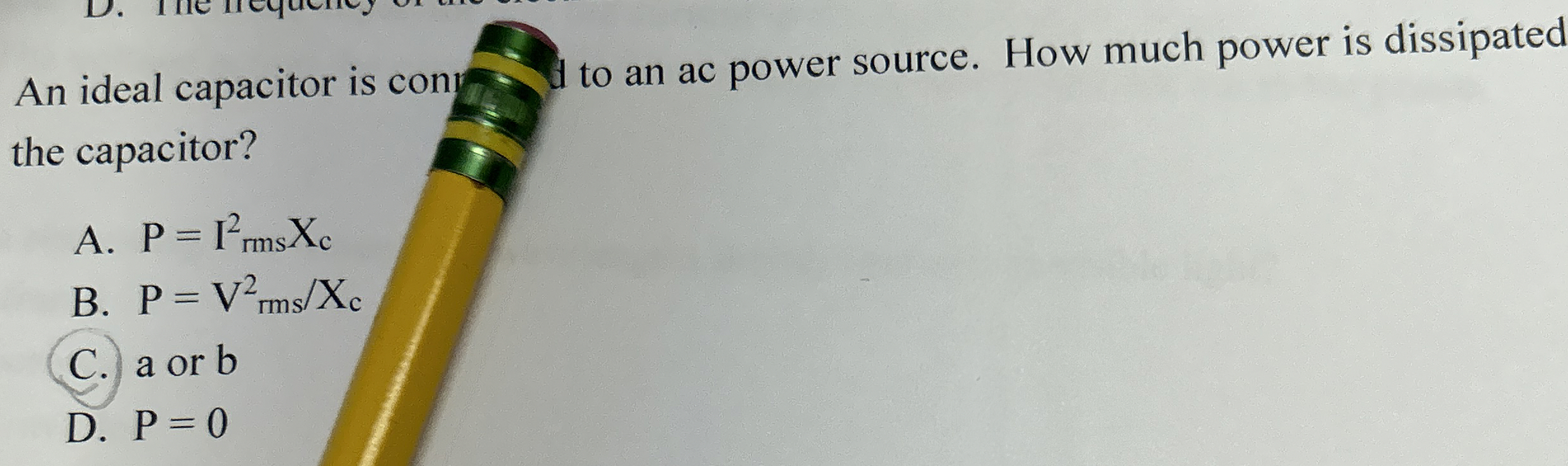 An ideal capacitor is cony to an ac power source.