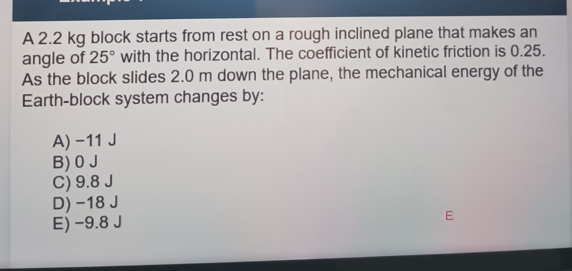 A 2 . 2 kg block starts from rest on a rough