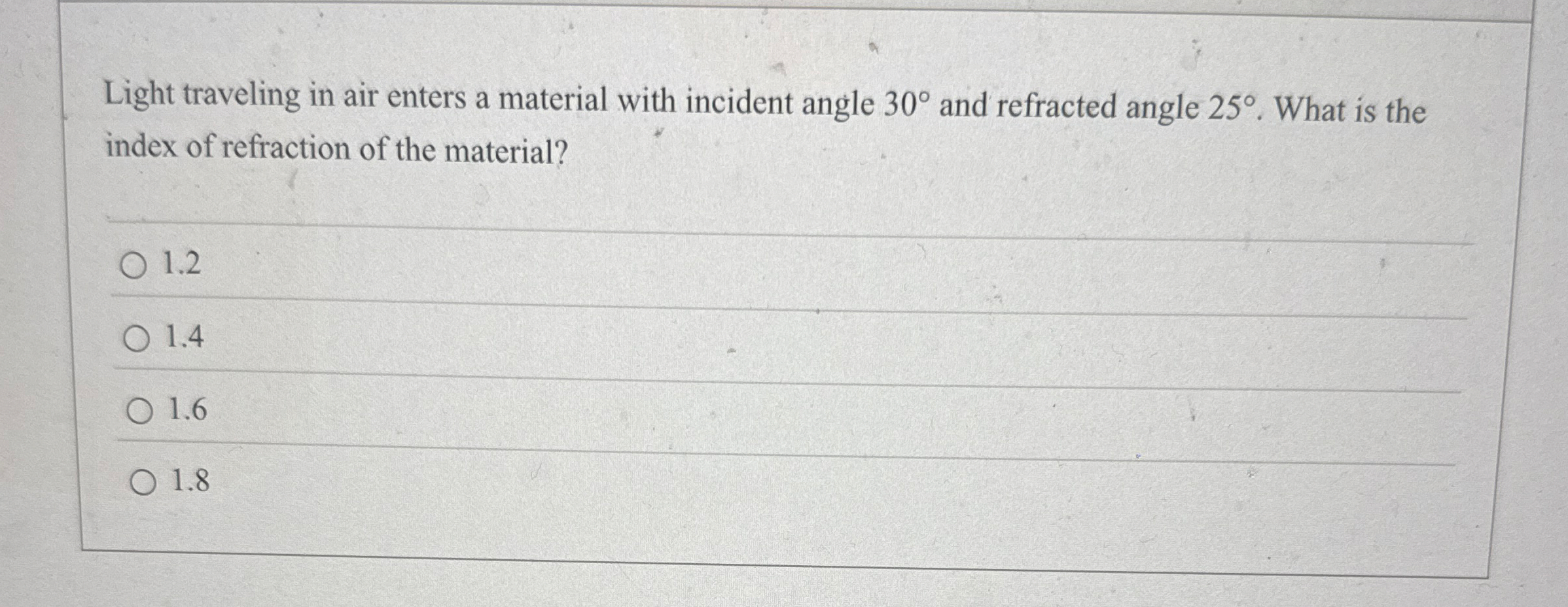 Light traveling in air enters a material with