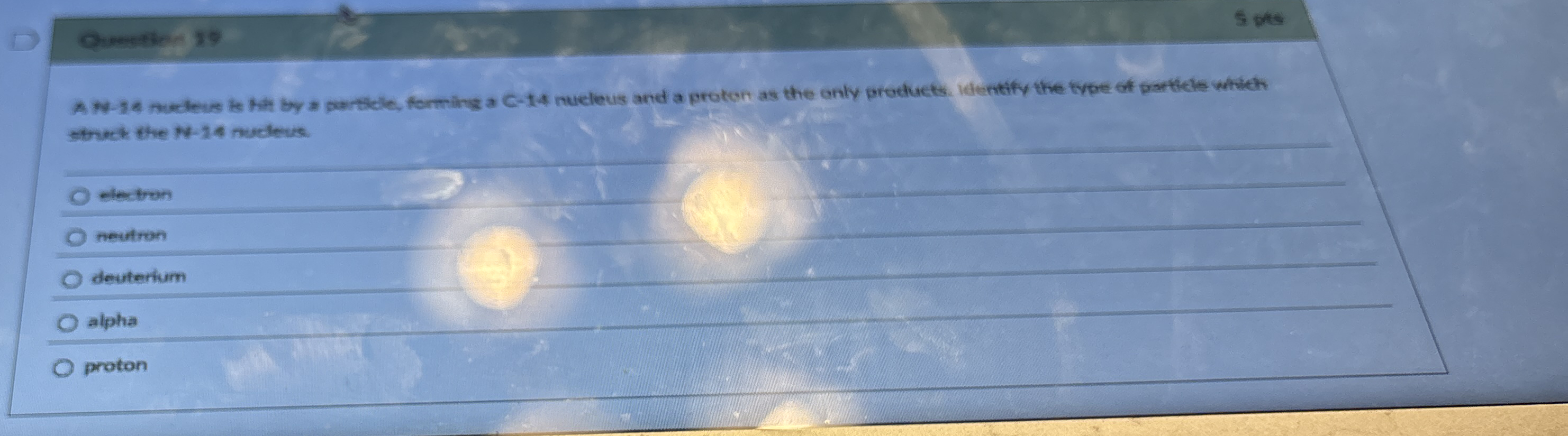 A N - 1 4 nucleus is hit by a particle, forming a