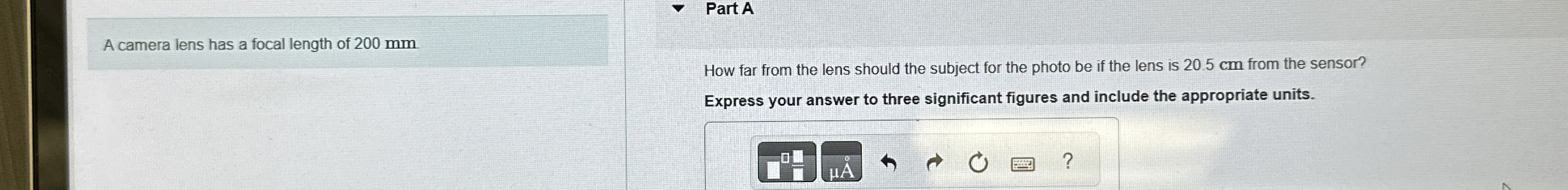 A camera lens has a focal length of 2 0 0 mm Part