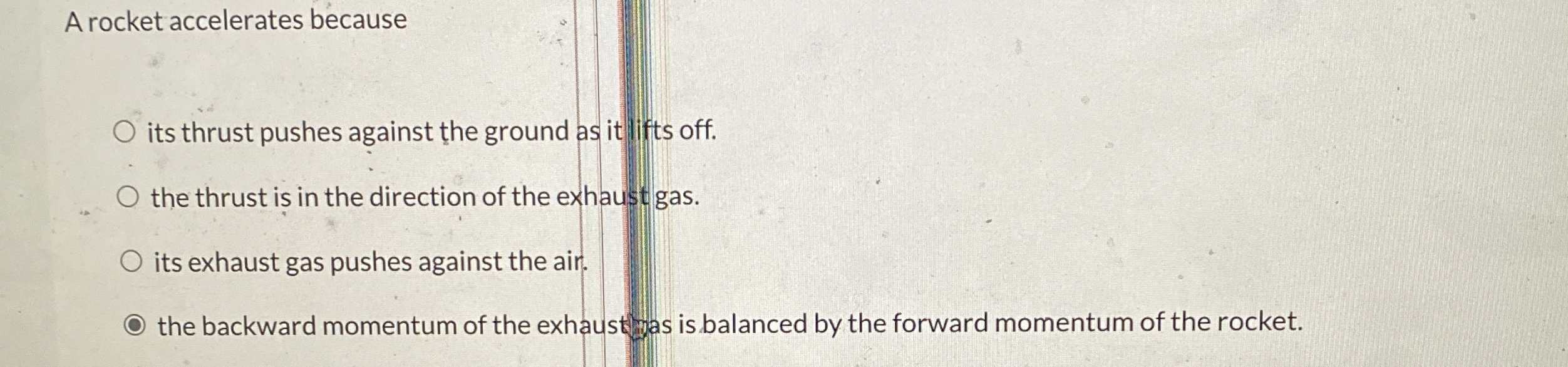 A rocket accelerates because its thrust pushes