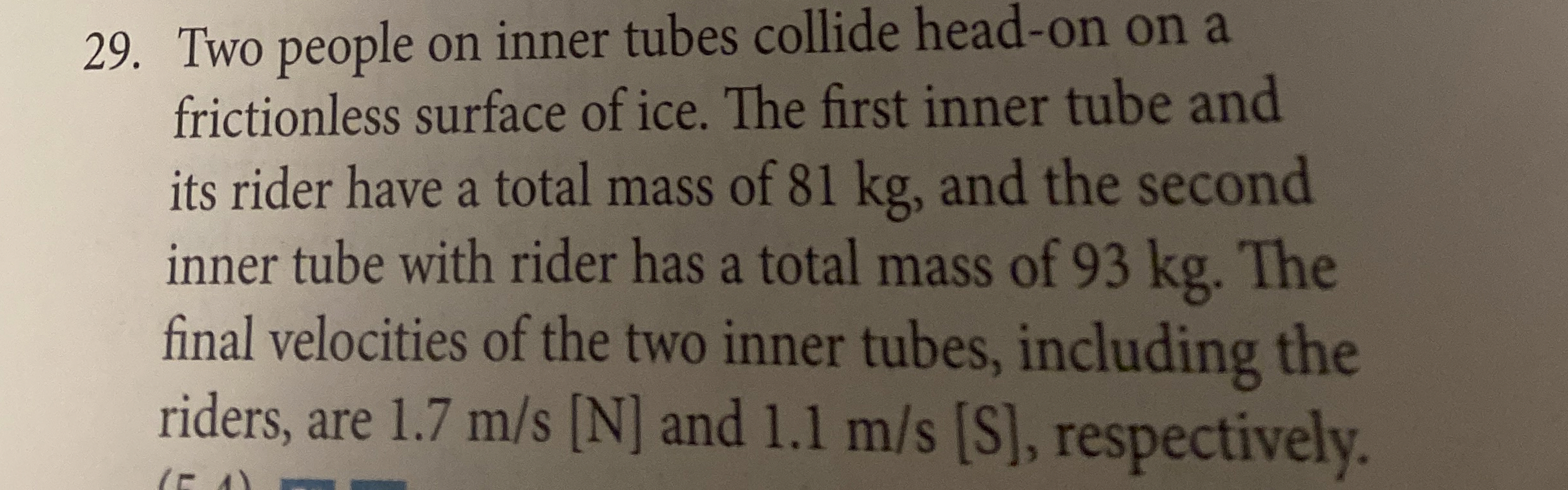 Two people on inner tubes collide head - on on a
