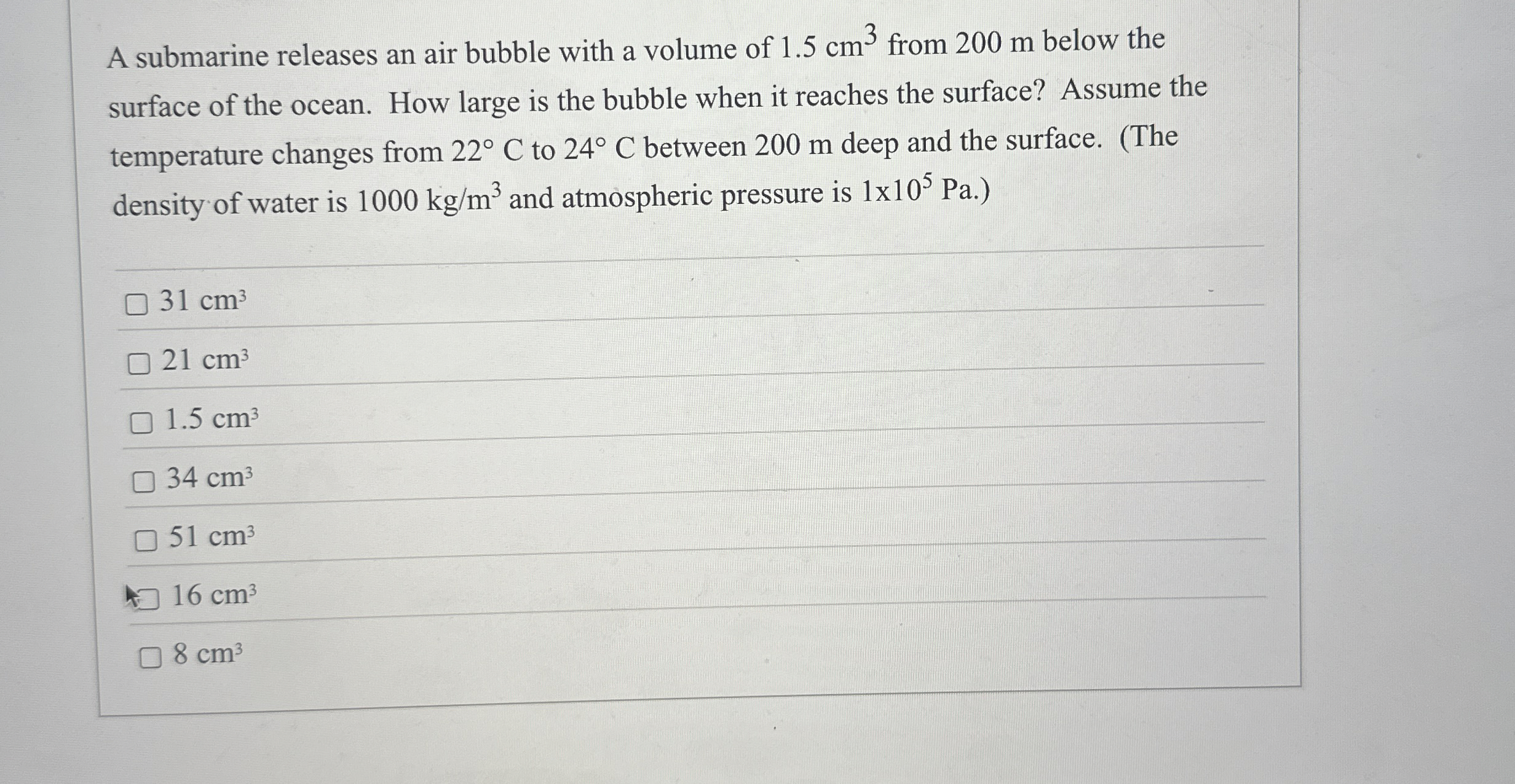 A submarine releases an air bubble with a volume