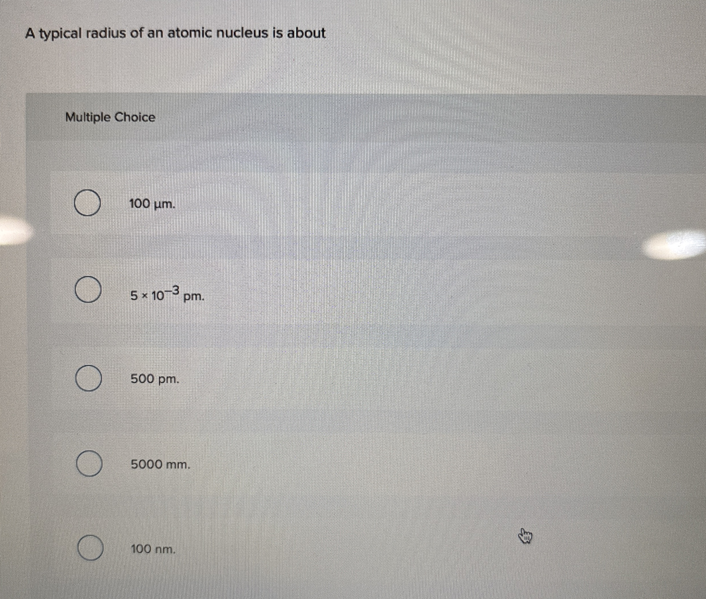 A typical radius of an atomic nucleus is about