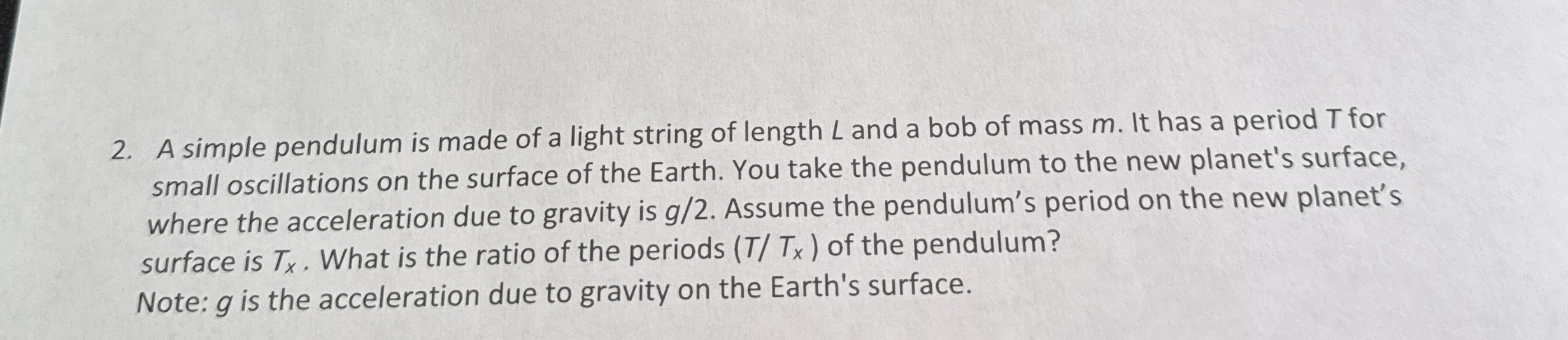 A simple pendulum is made of a light string of