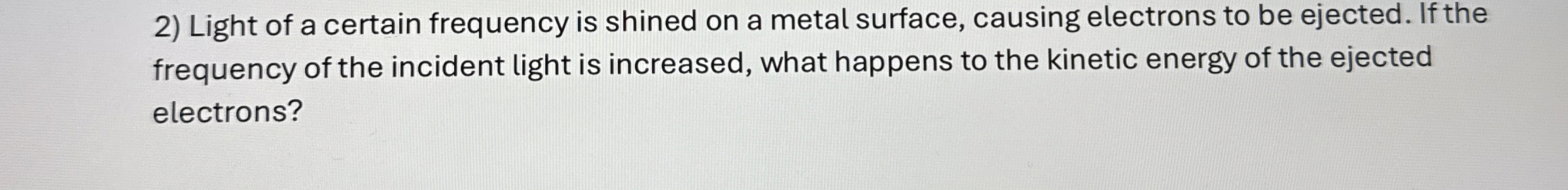 Light of a certain frequency is shined on a metal