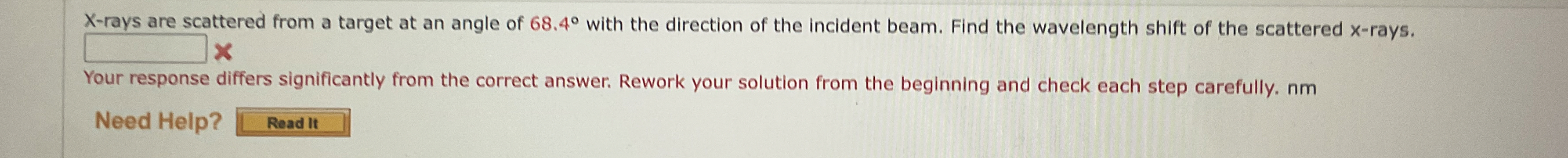 X - rays are scattered from a target at an angle