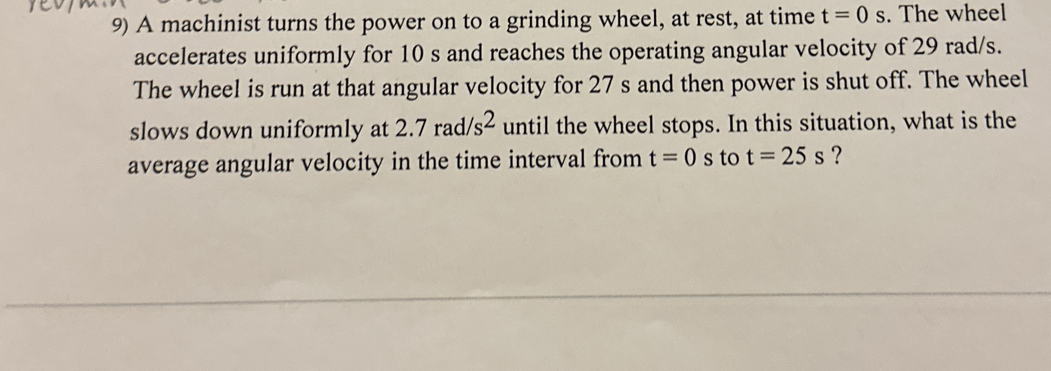 A machinist turns the power on to a grinding