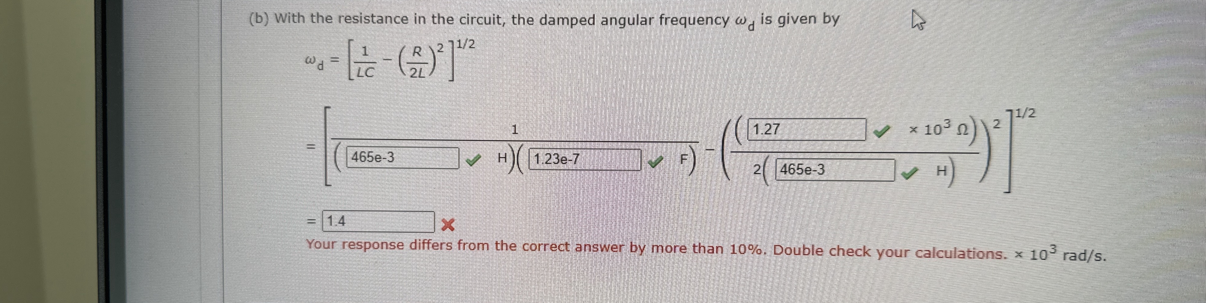 ( b ) With the resistance in the circuit, the