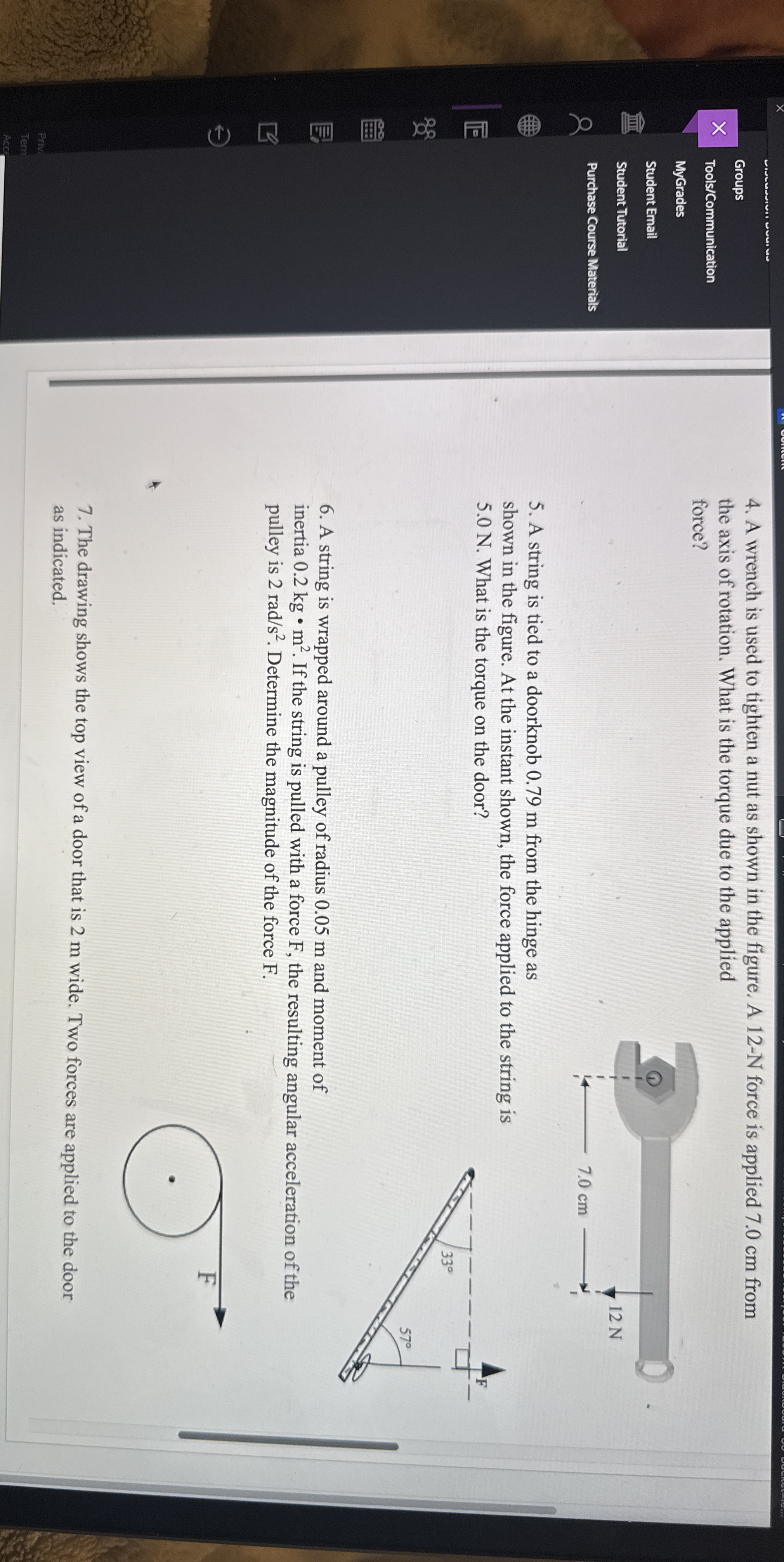 A wrench is used to tighten a nut as shown in the