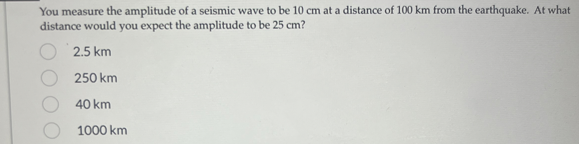 You measure the amplitude of a seismic wave to be