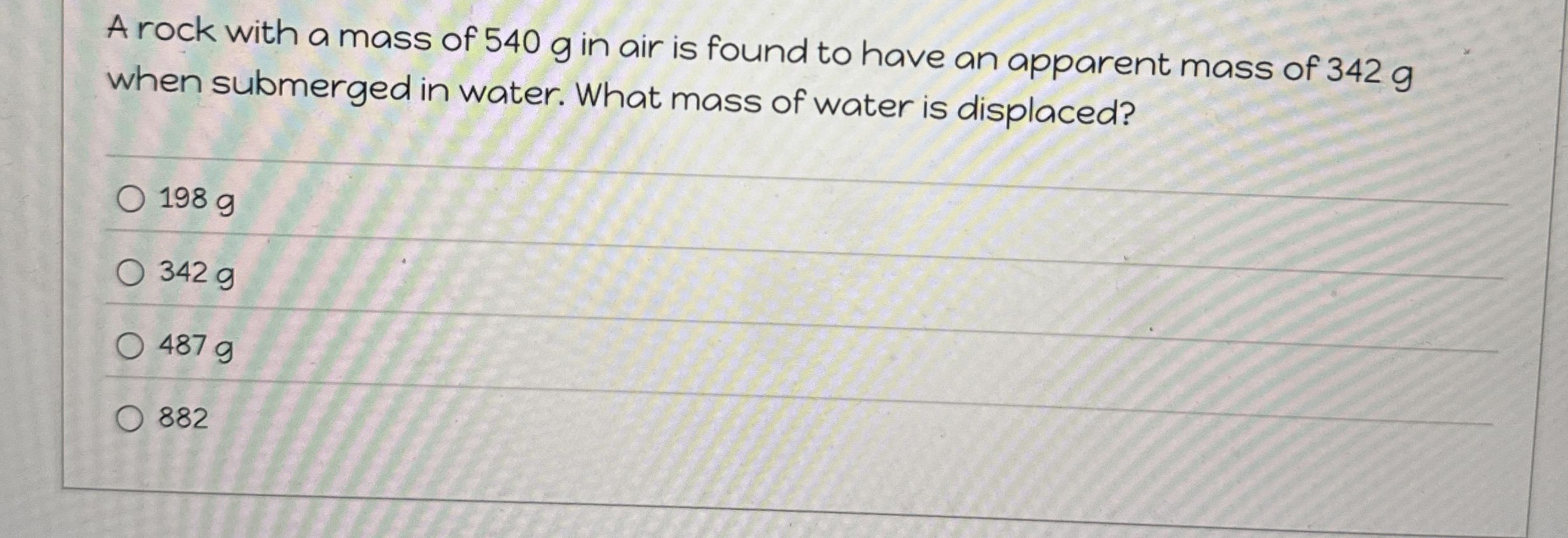 A rock with a mass of 5 4 0 g in air is found to