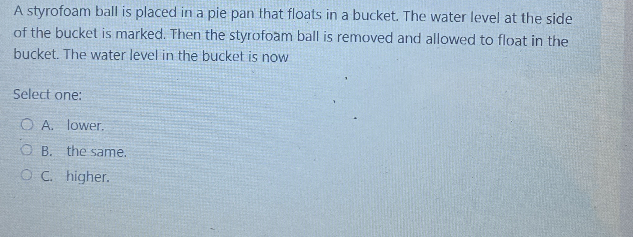 A styrofoam ball is placed in a pie pan that