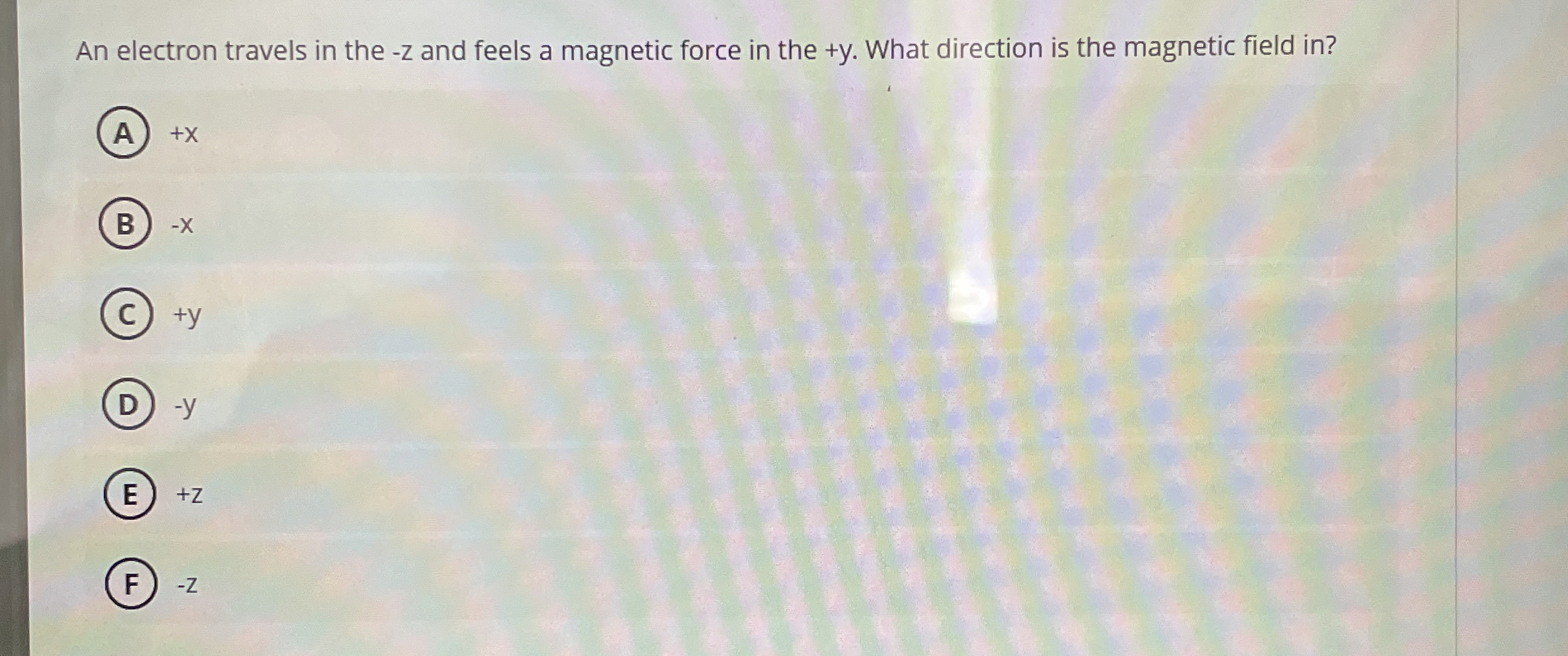 An electron travels in the - z and feels a