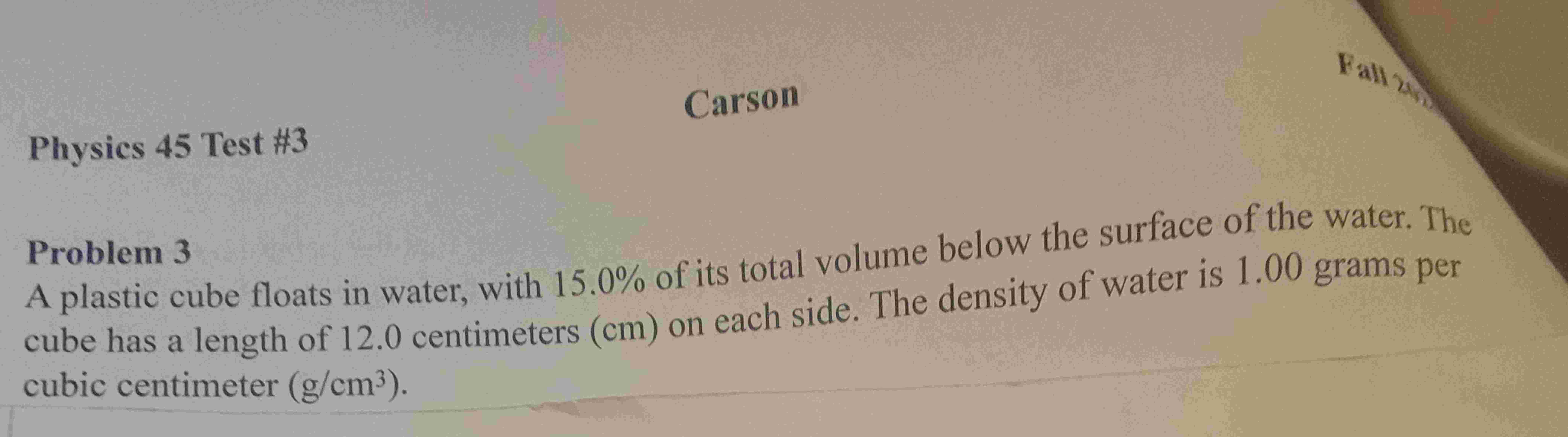Problem 3 A plastic cube floats in water, with 1