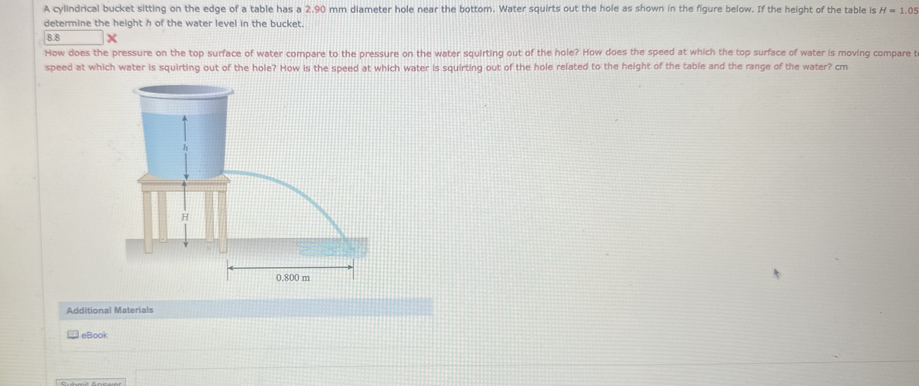 A cylindrical bucket sitting on the edge of a