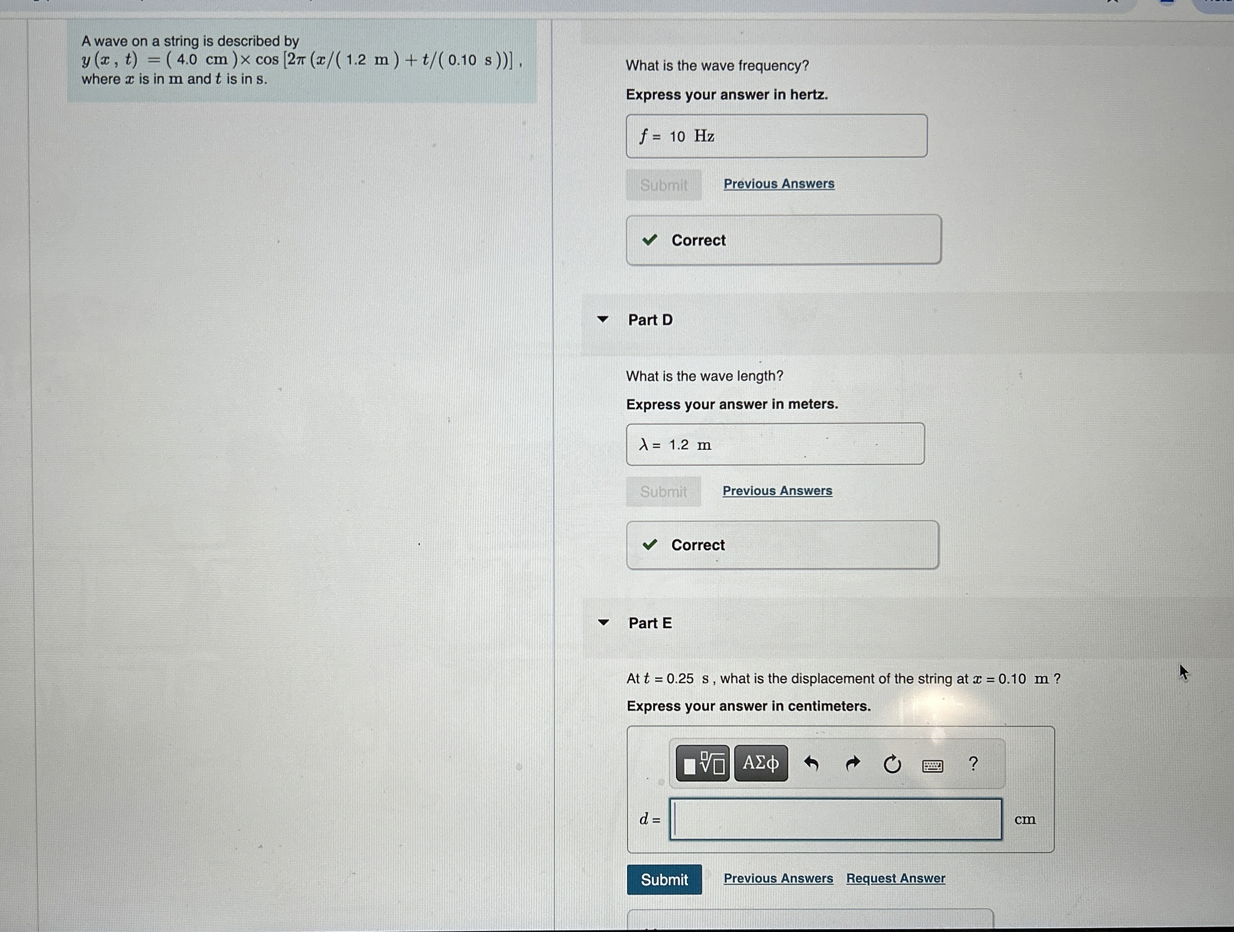 A wave on a string is described by y ( x , t ) =