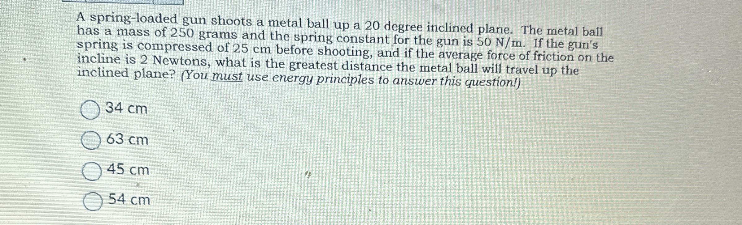 A spring - loaded gun shoots a metal ball up a 2
