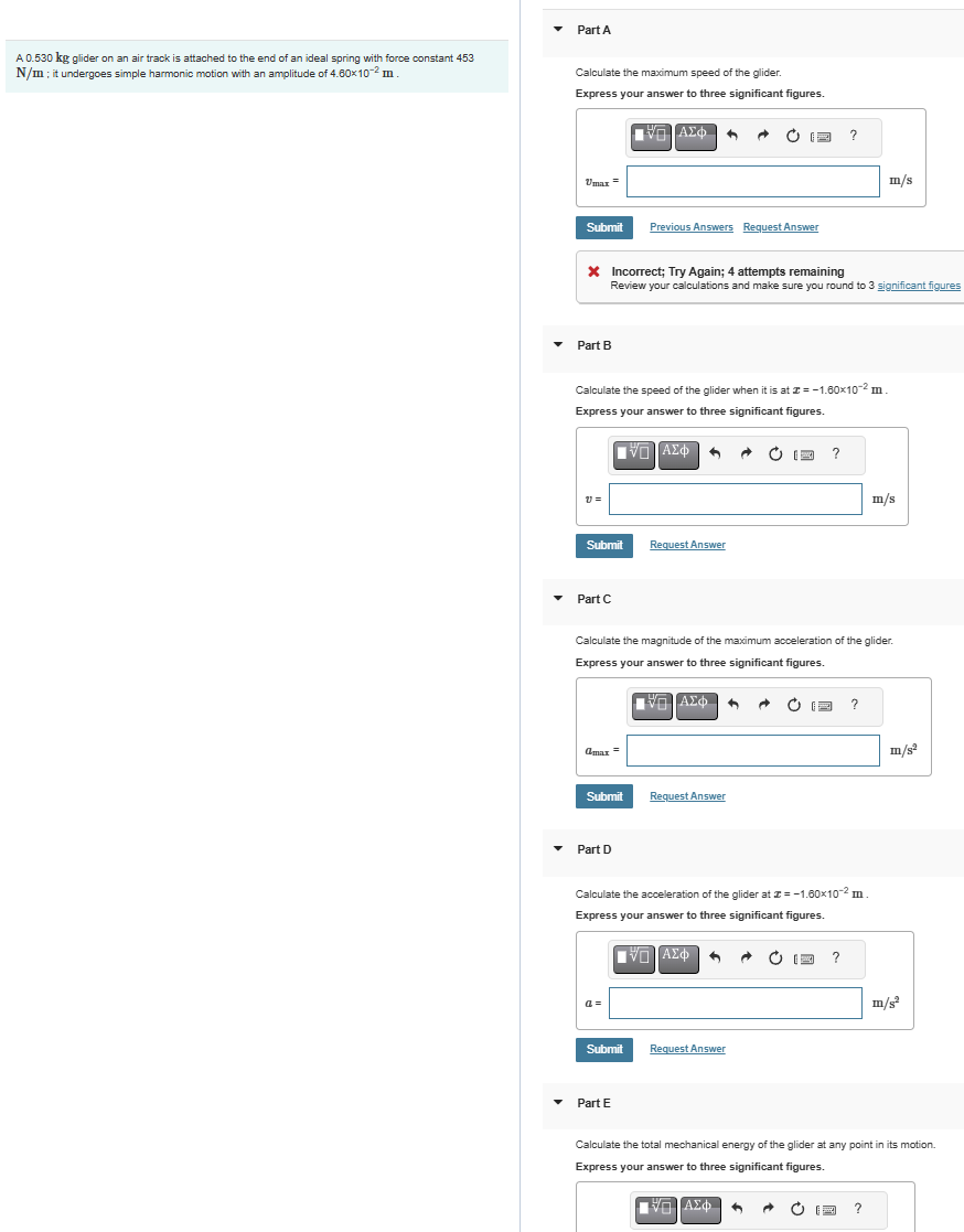A 0 . 5 3 0 kg glider on an air track is attached