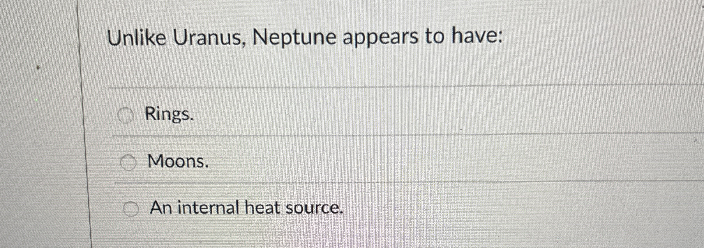 Unlike Uranus, Neptune appears to have: Rings.