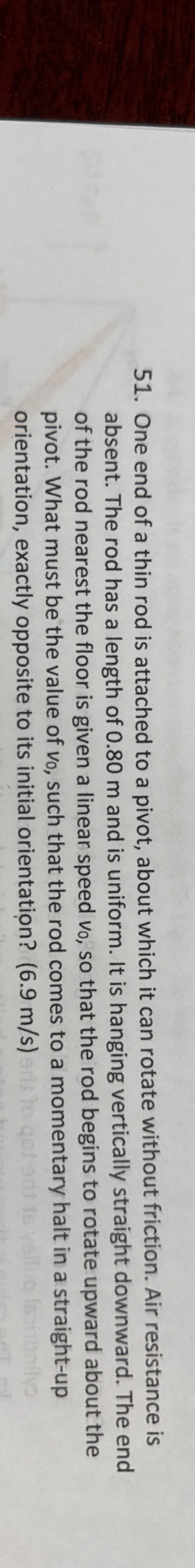 One end of a thin rod is attached to a pivot,