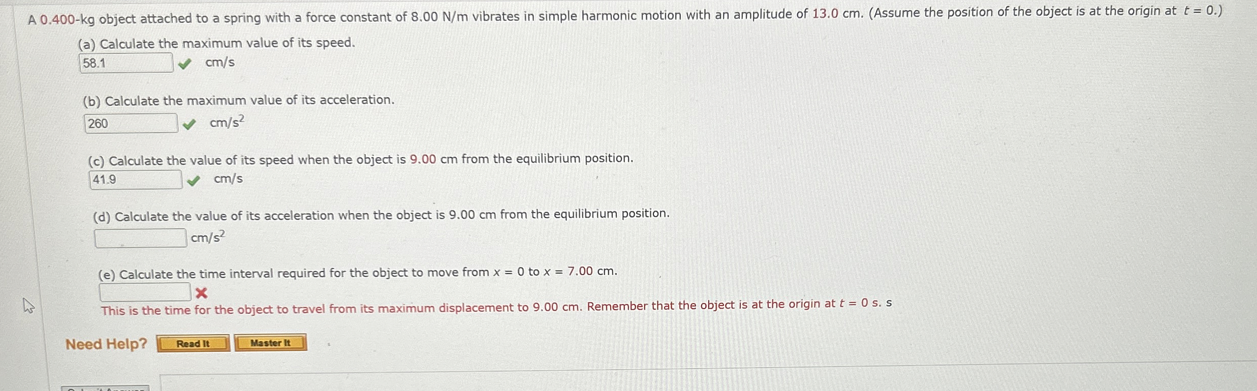 A 0 . 4 0 0 - k g object attached to a spring