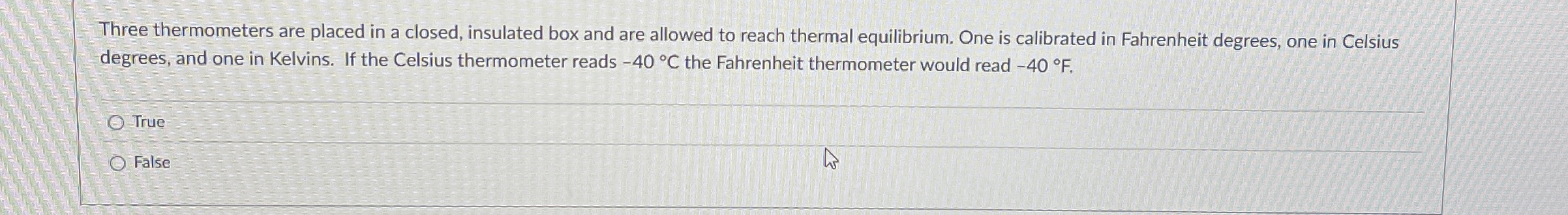Three thermometers are placed in a closed,