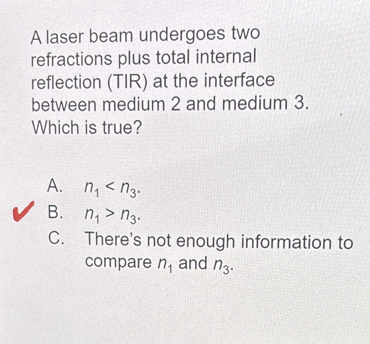 A laser beam undergoes two refractions plus total