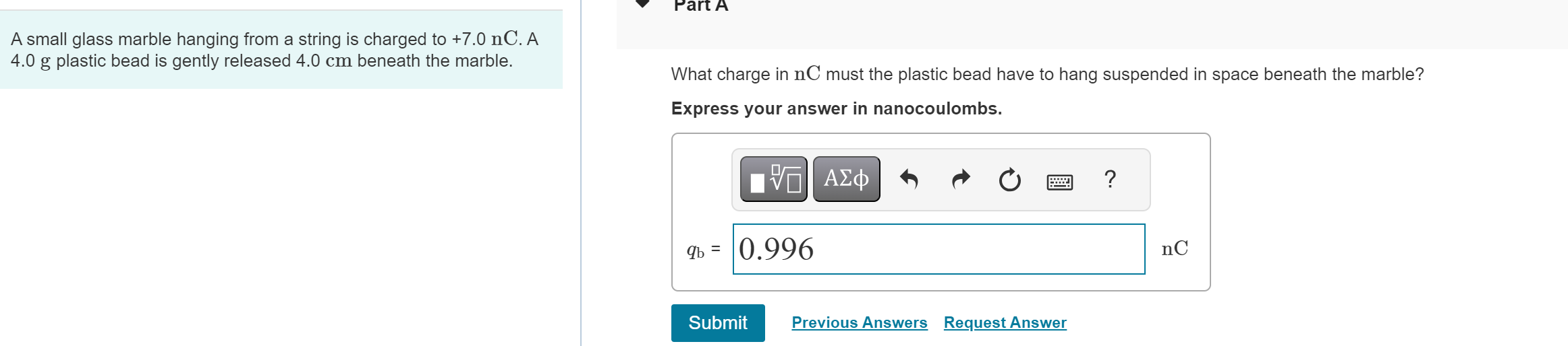 A small glass marble hanging from a string is