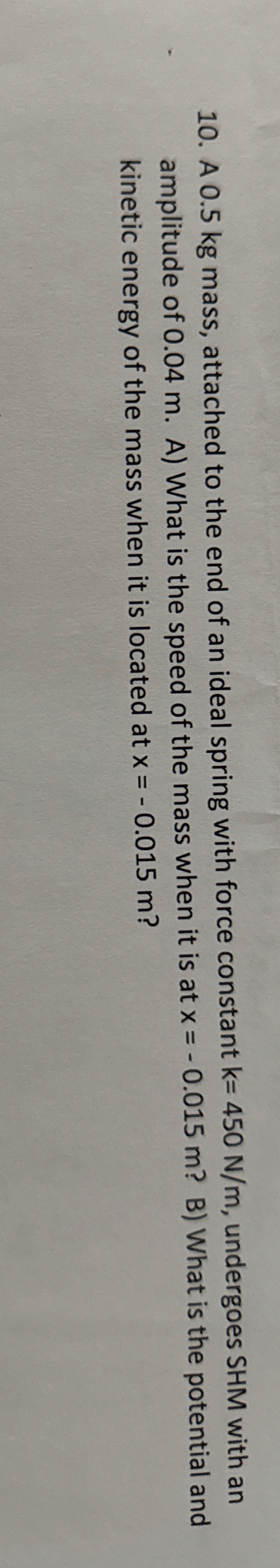 A 0 . 5 kg mass, attached to the end of an ideal