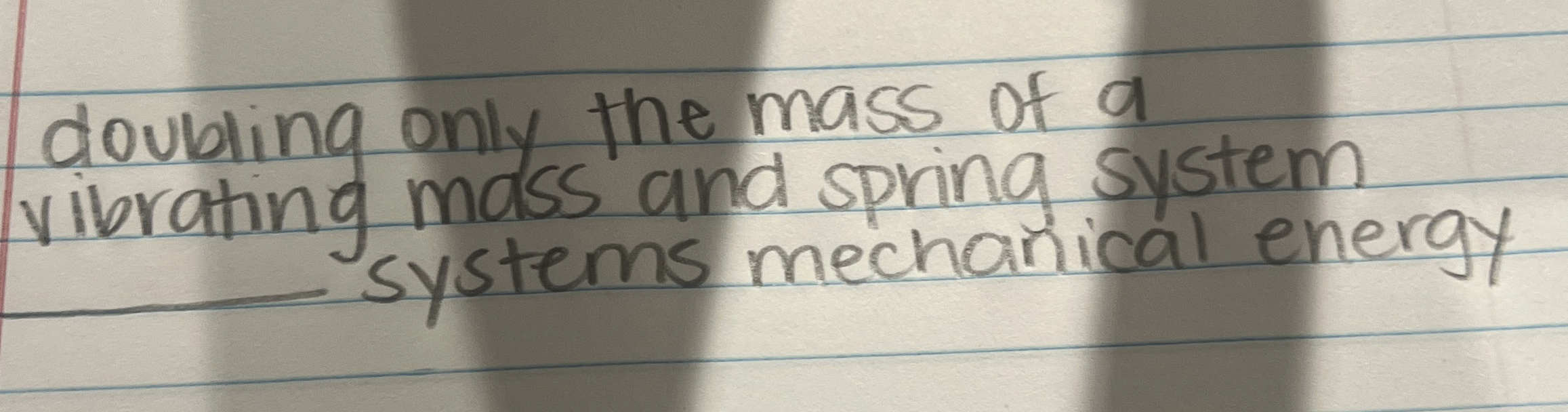 doubling only the mass of a vibrating mass and