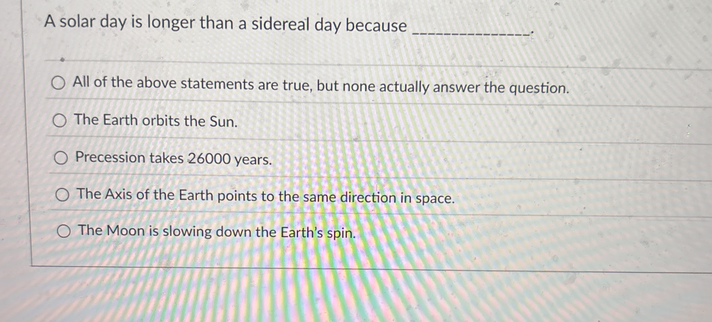 A solar day is longer than a sidereal day because