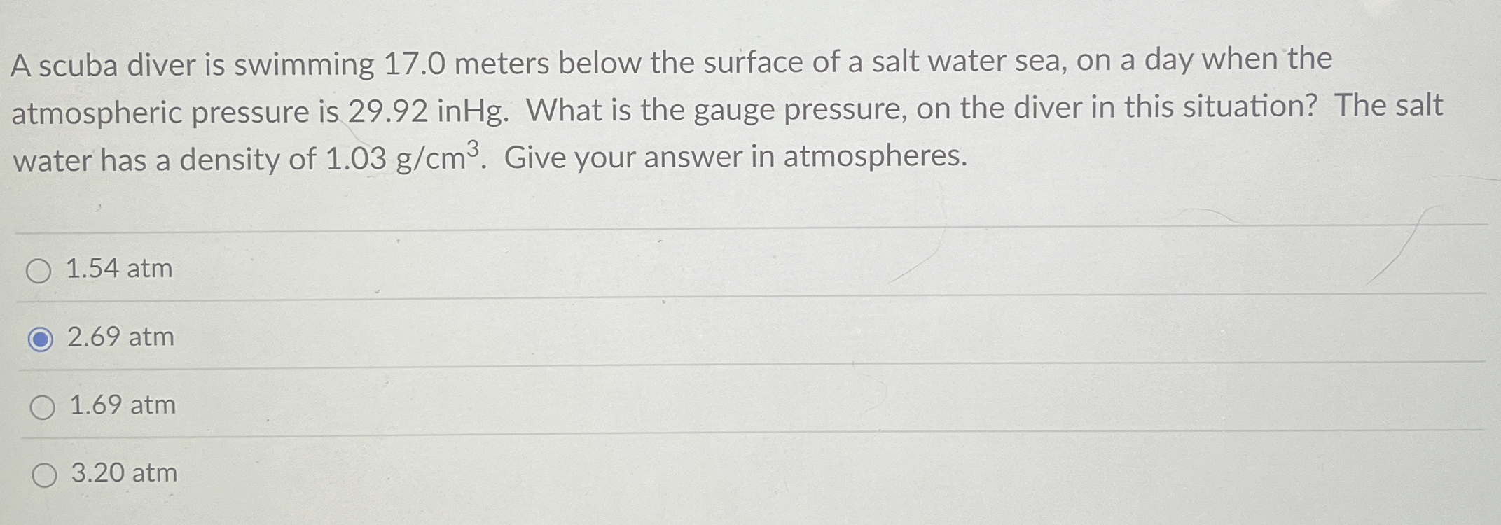 A scuba diver is swimming 1 7 . 0 meters below