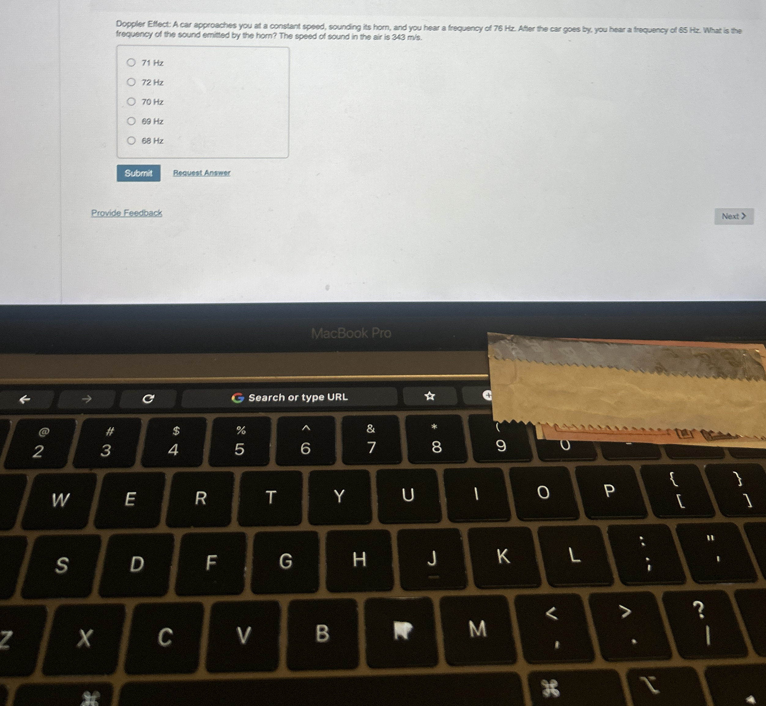 Doppler Eflect: A car approaches you at a