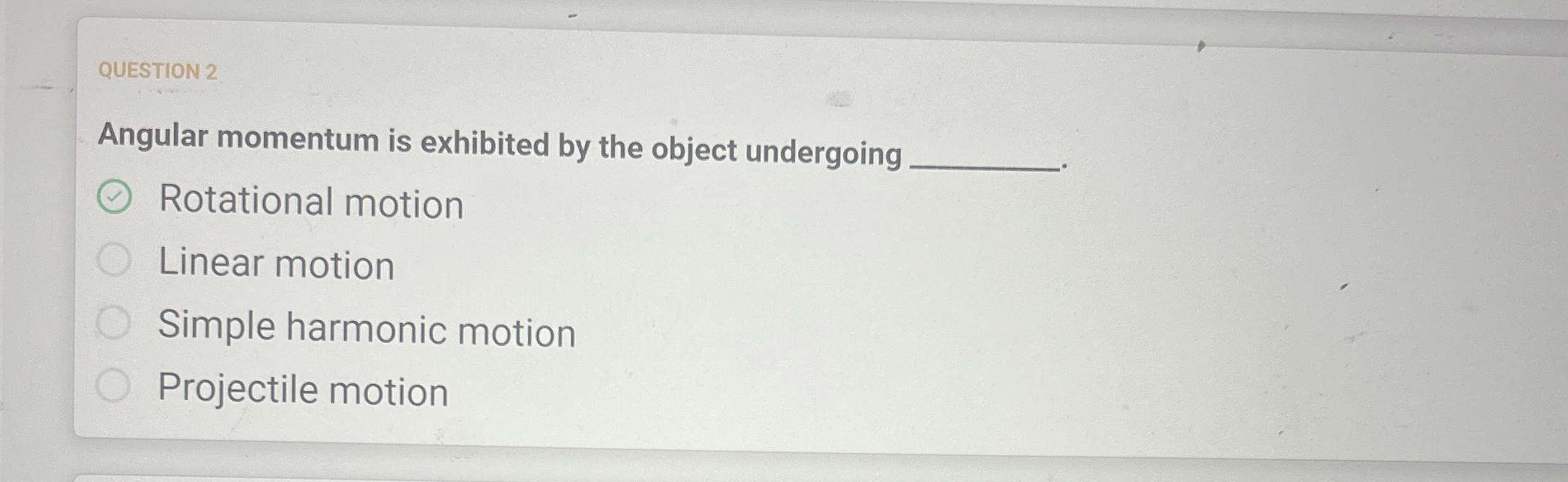QUESTION 2 Angular momentum is exhibited by the