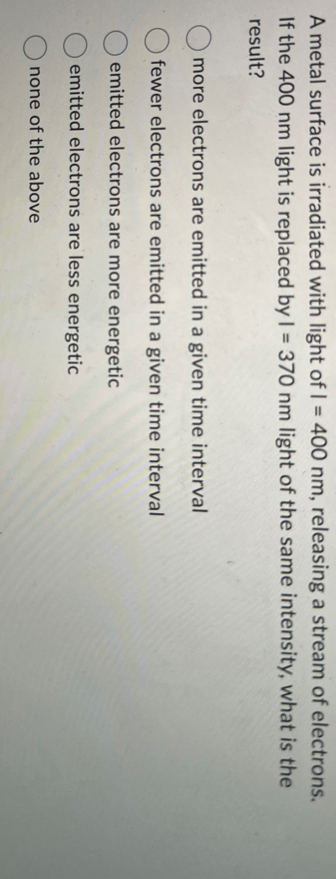A metal surface is irradiated with light of I = 4
