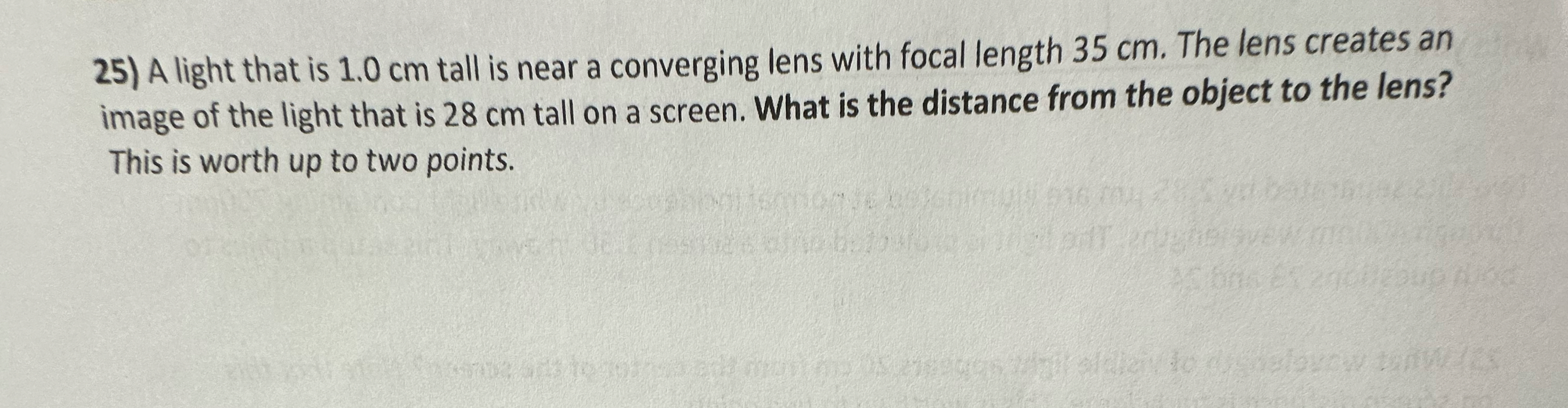 A light that is 1 . 0 cm tall is near a