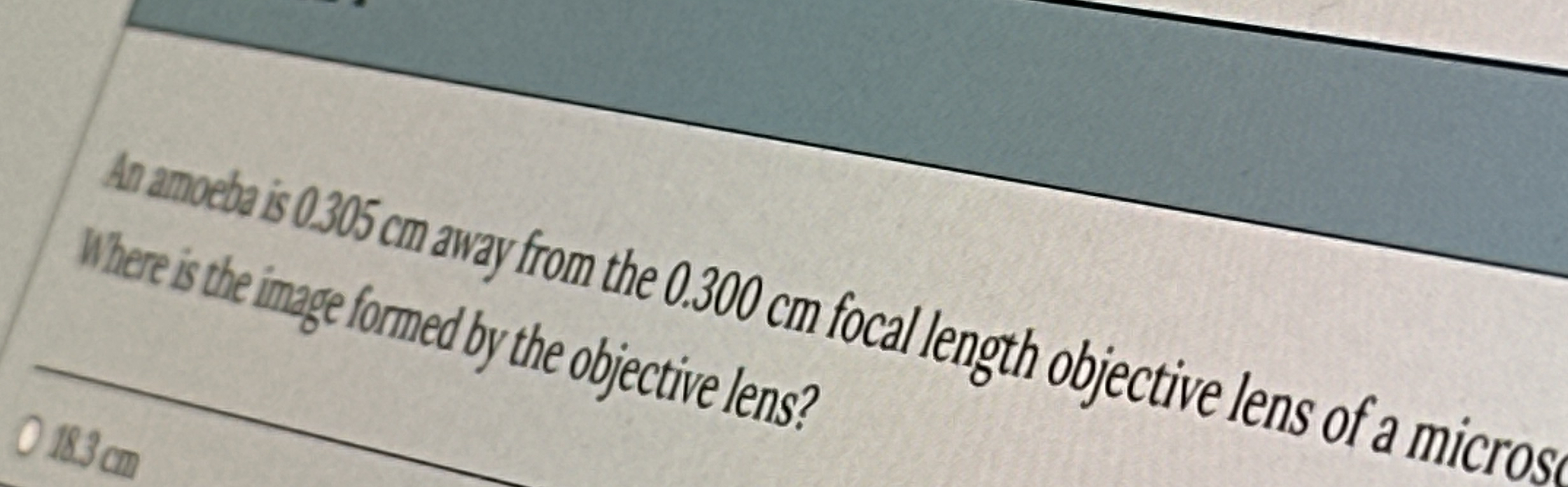 Where is the ingue formed by the objective lens?