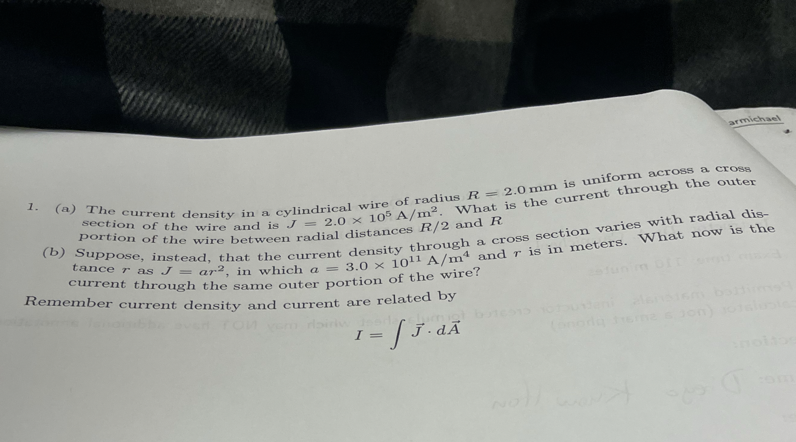 ( a ) The current density in a cylindrical wire