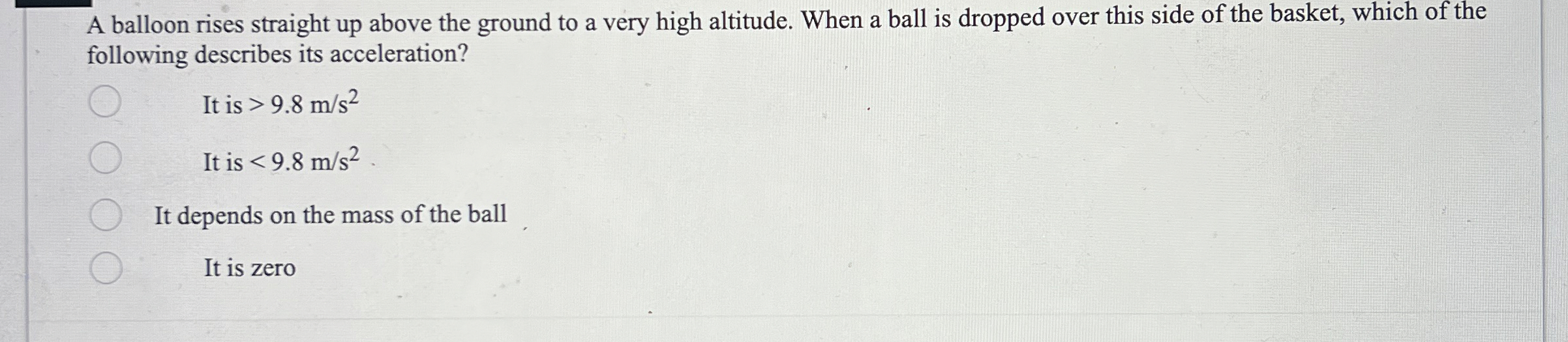 A balloon rises straight up above the ground to a