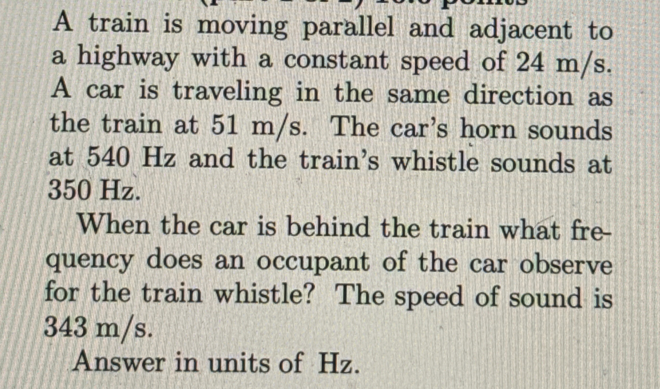 A train is moving parallel and adjacent to a