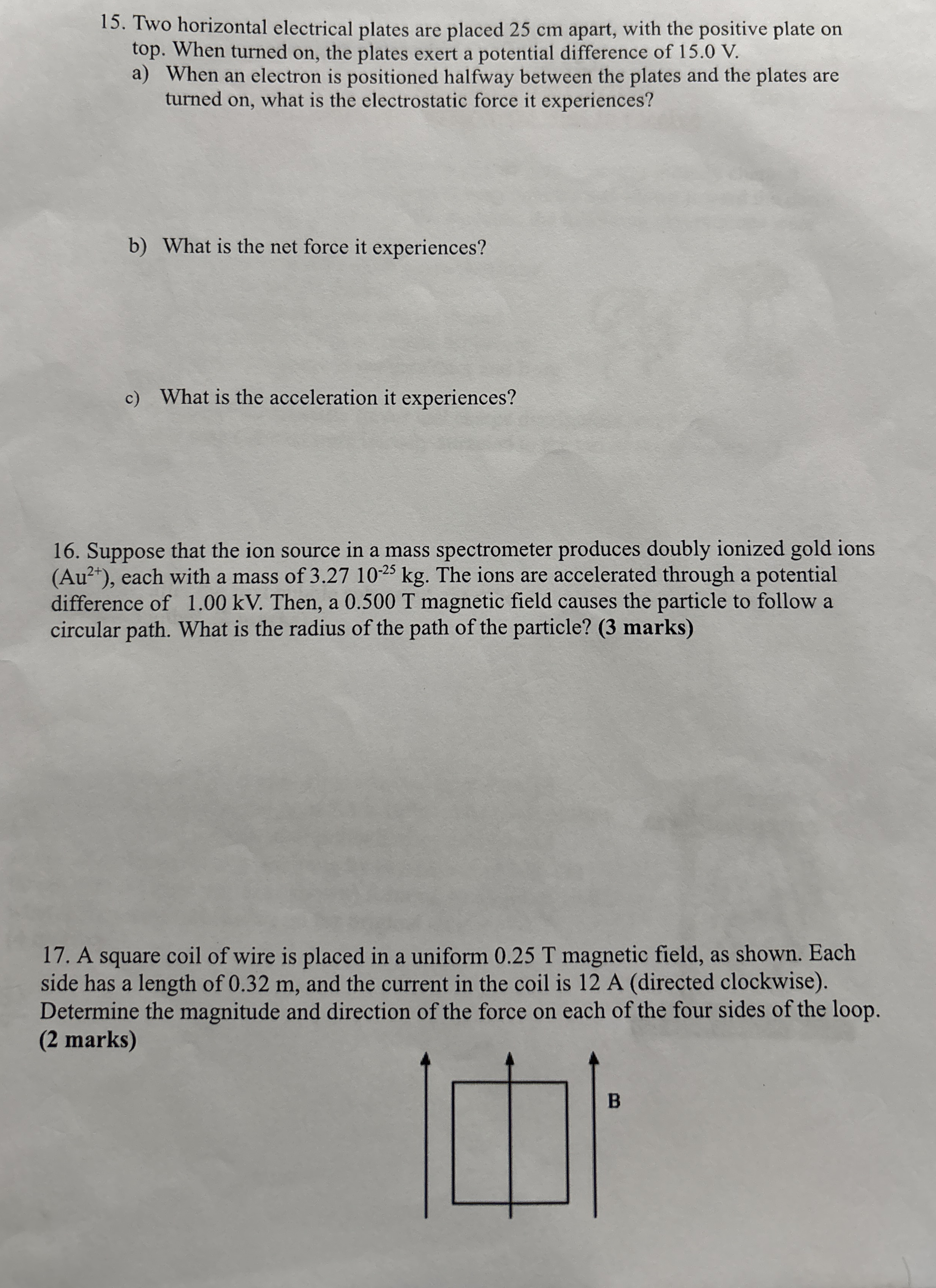 Two horizontal electrical plates are placed 2 5