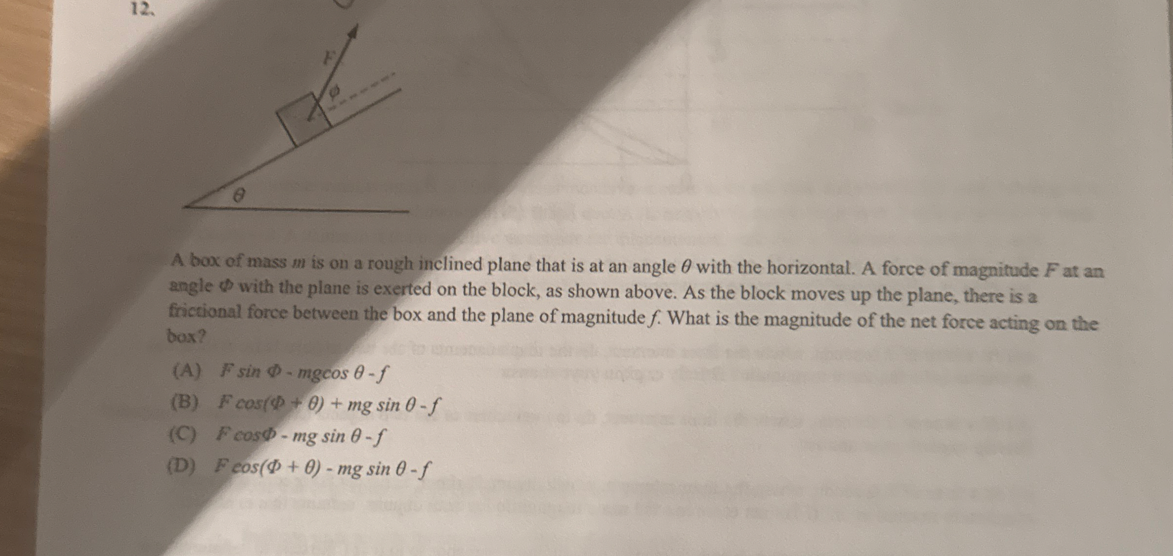 A box of mass m is on a rough inclined plane that