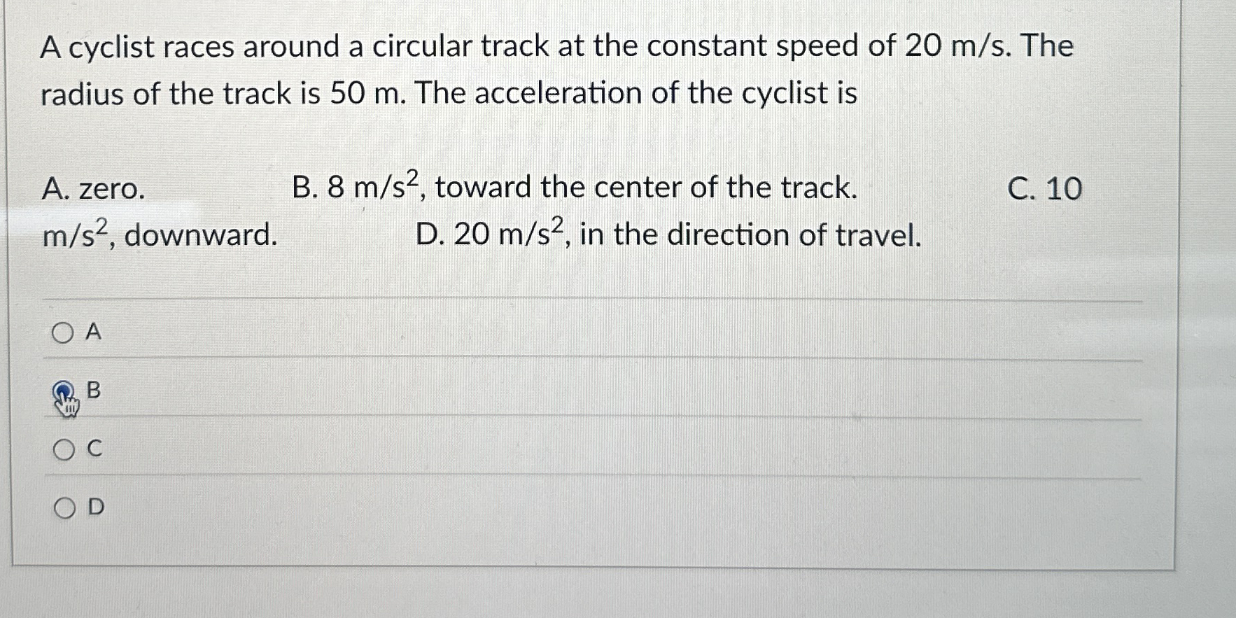 A cyclist races around a circular track at the
