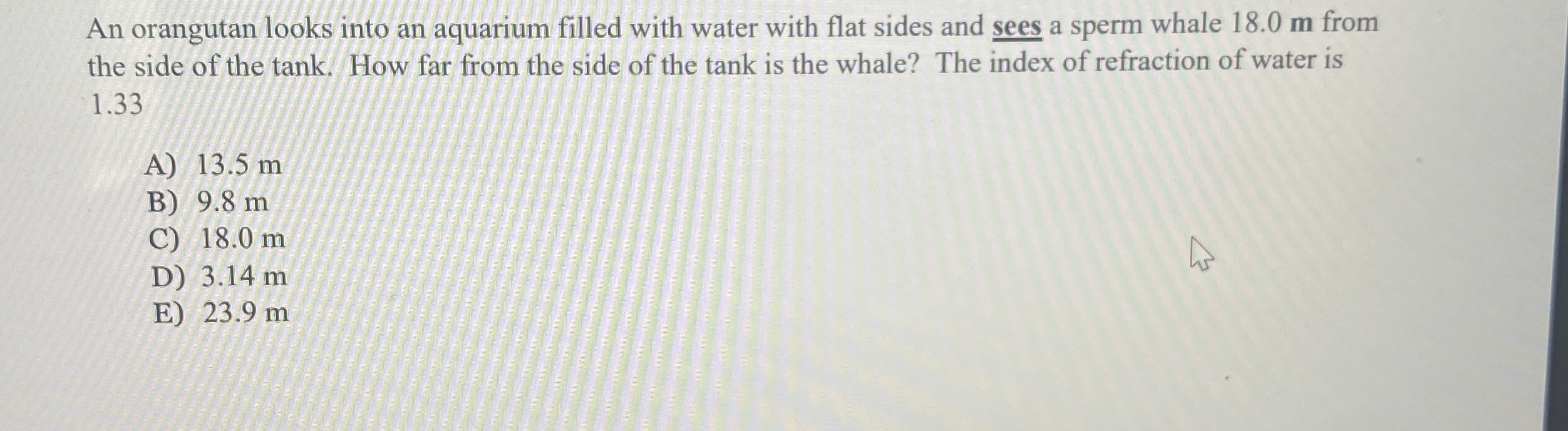 An orangutan looks into an aquarium filled with