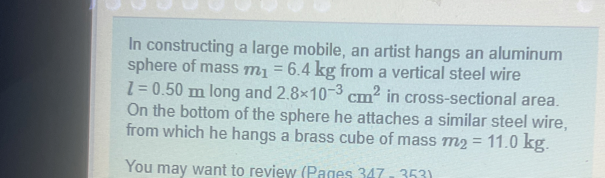 In constructing a large mobile, an artist hangs