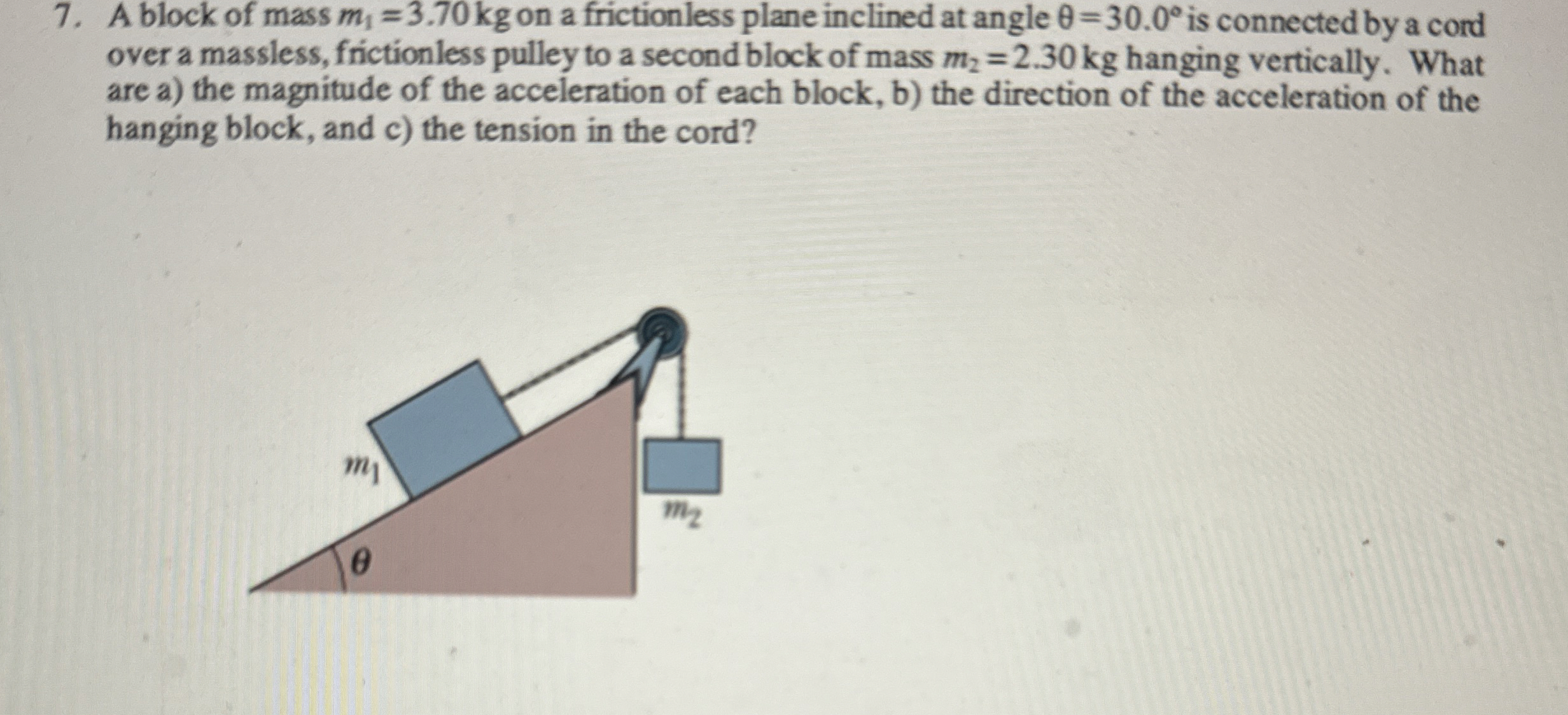 A block of mass m 1 = 3 . 7 0 k g on a