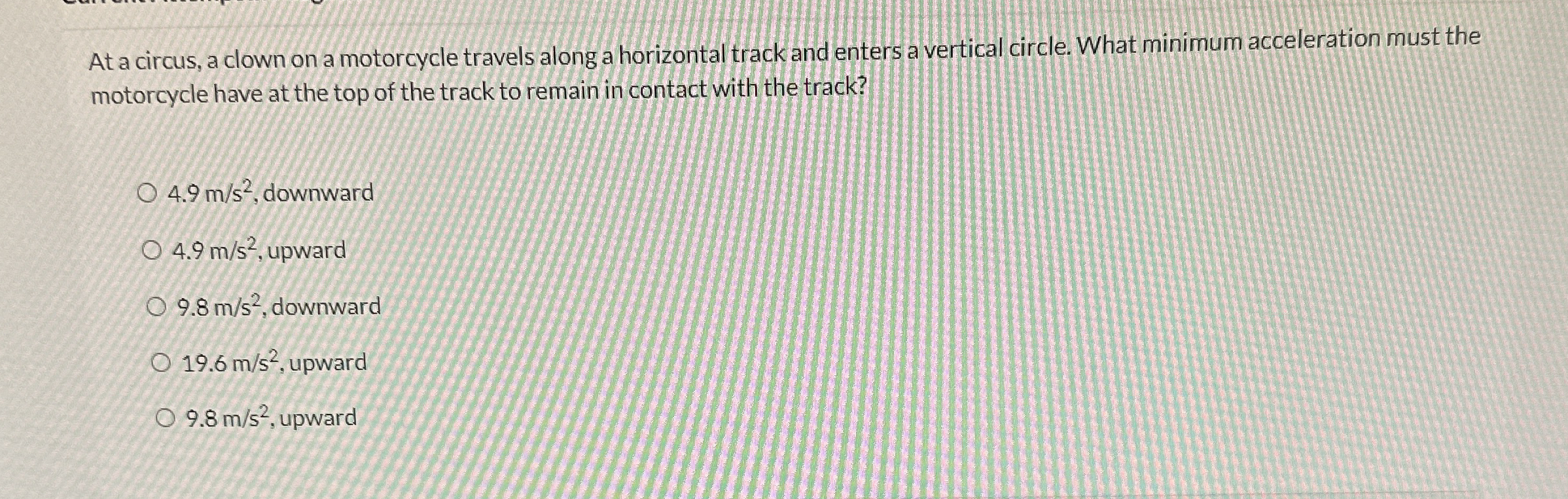 At a circus, a clown on a motorcycle travels