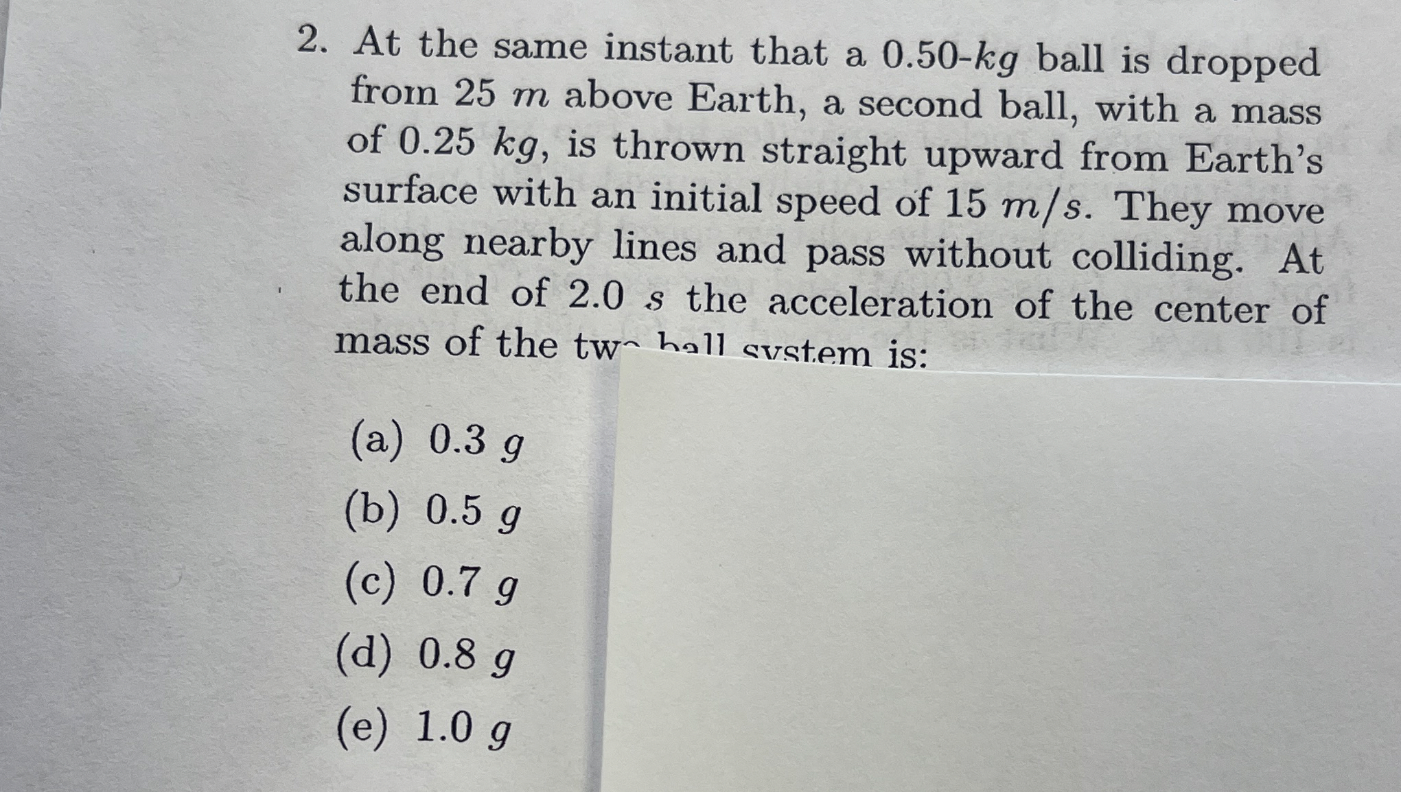 At the same instant that a 0 . 5 0 - k g ball is